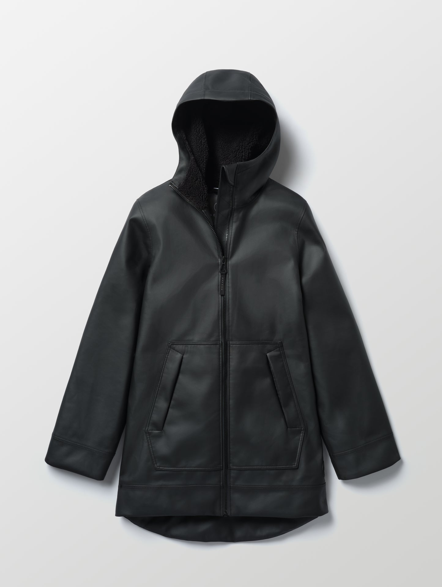 Flat lay of the Quest Sherpa-Lined Rain Jacket Onyx Black from AETHER Apparel. 