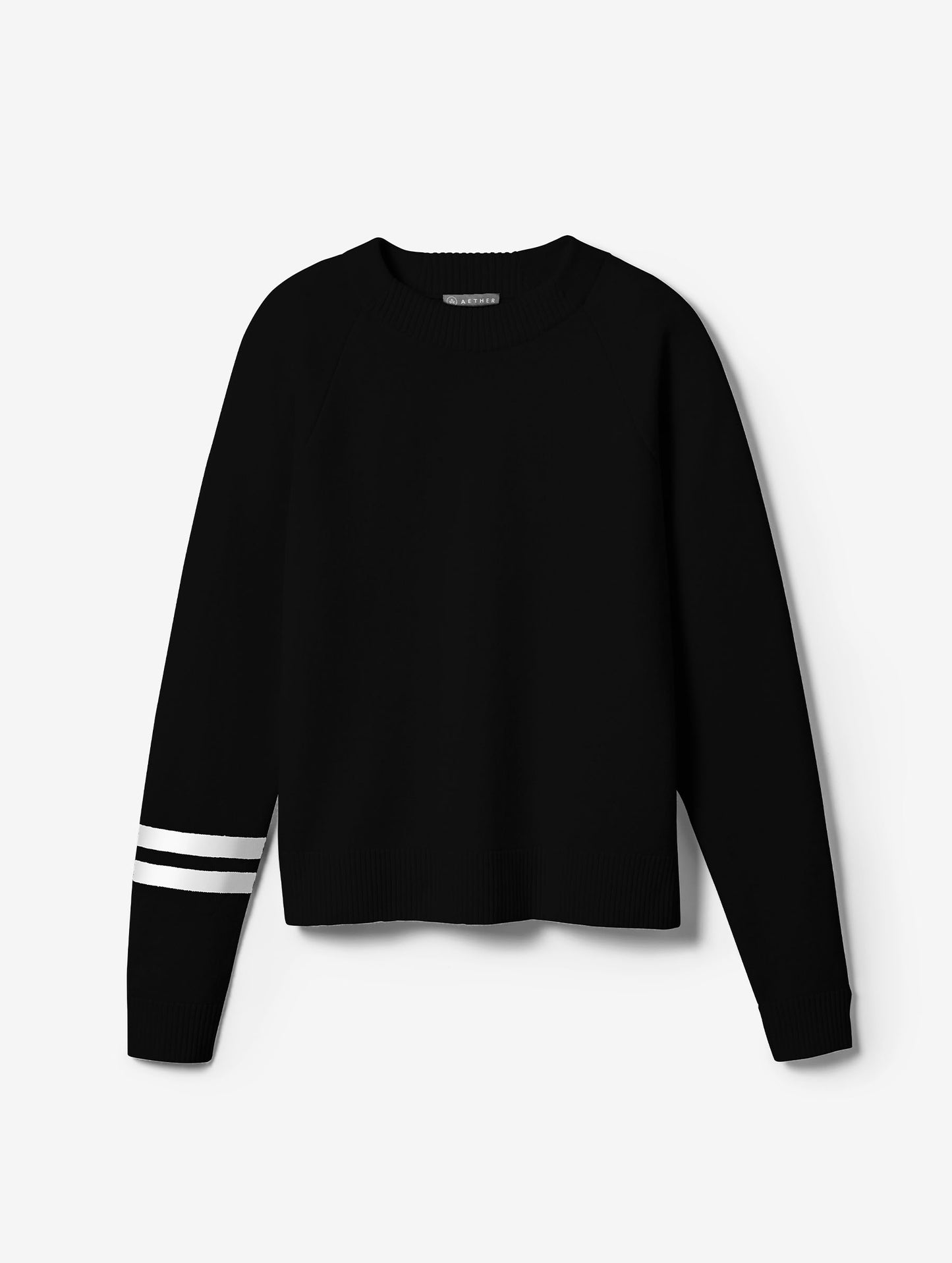 Flat lay image of Racer Sweater 2.0 in Onyx Black from AETHER Apparel.