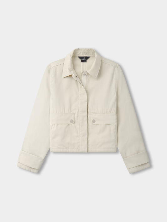 Flat lay view of the Raven Waxed Cotton Jacket in Bone from AETHER.