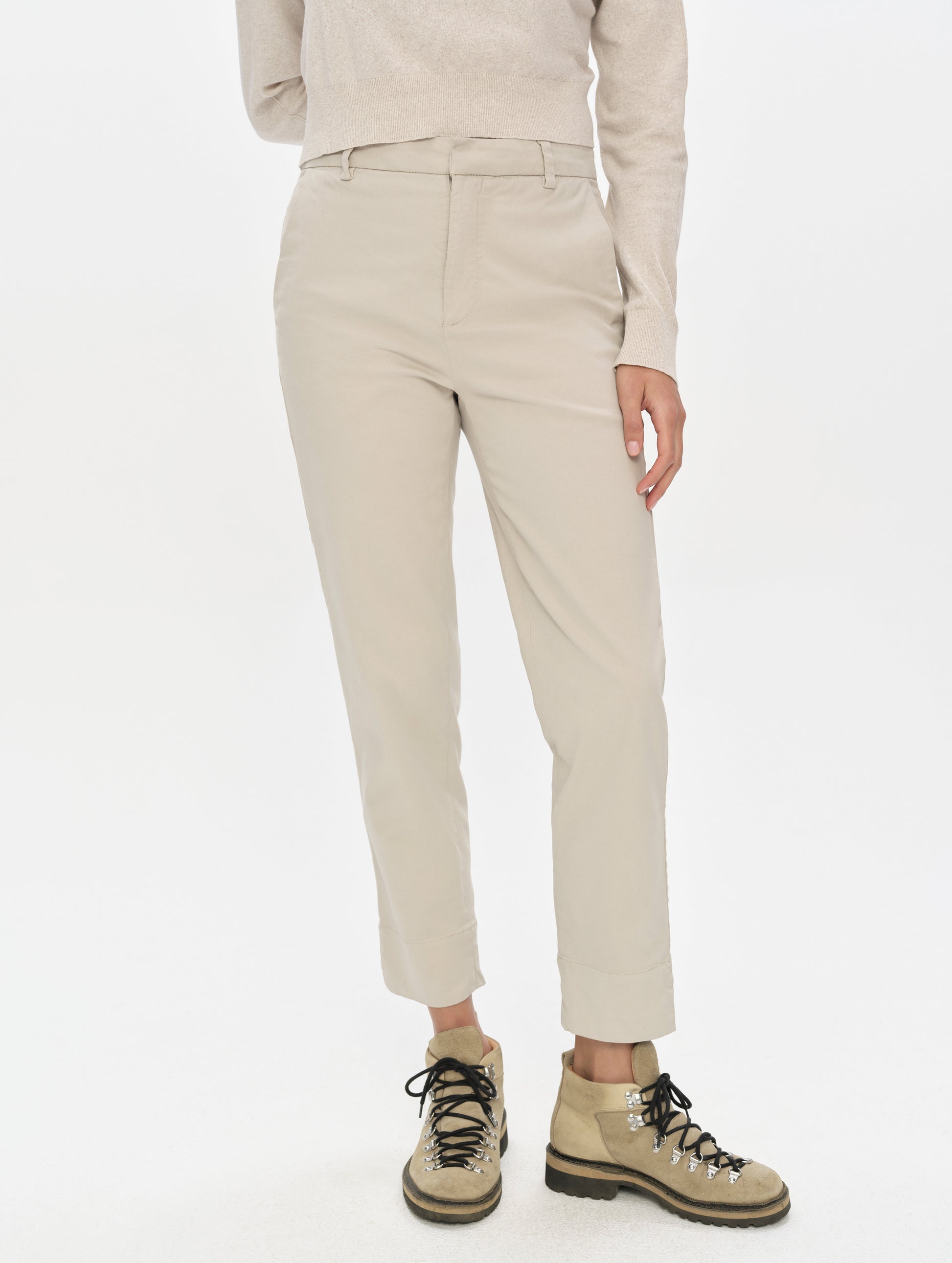 Front, lower-body view of woman wearing the Rhy Straight Leg Pant in Bone from AETHER Apparel.