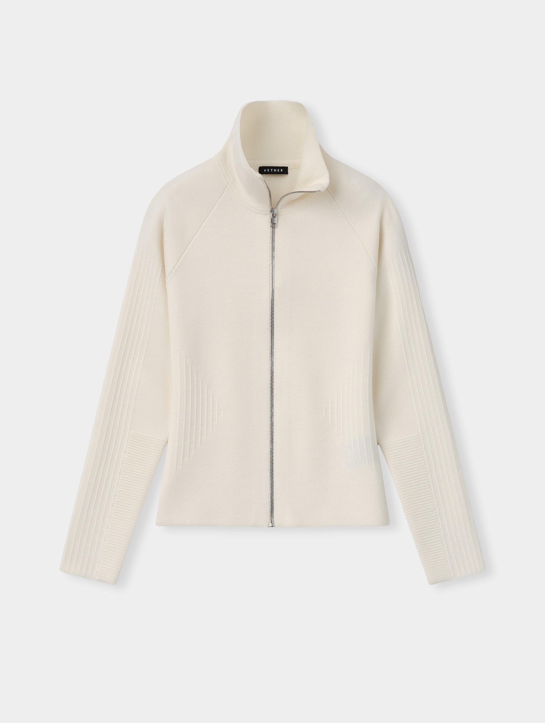 Flat lay view of the Riley Full-Zip Sweater 2.0 in Winter White from AETHER Apparel.