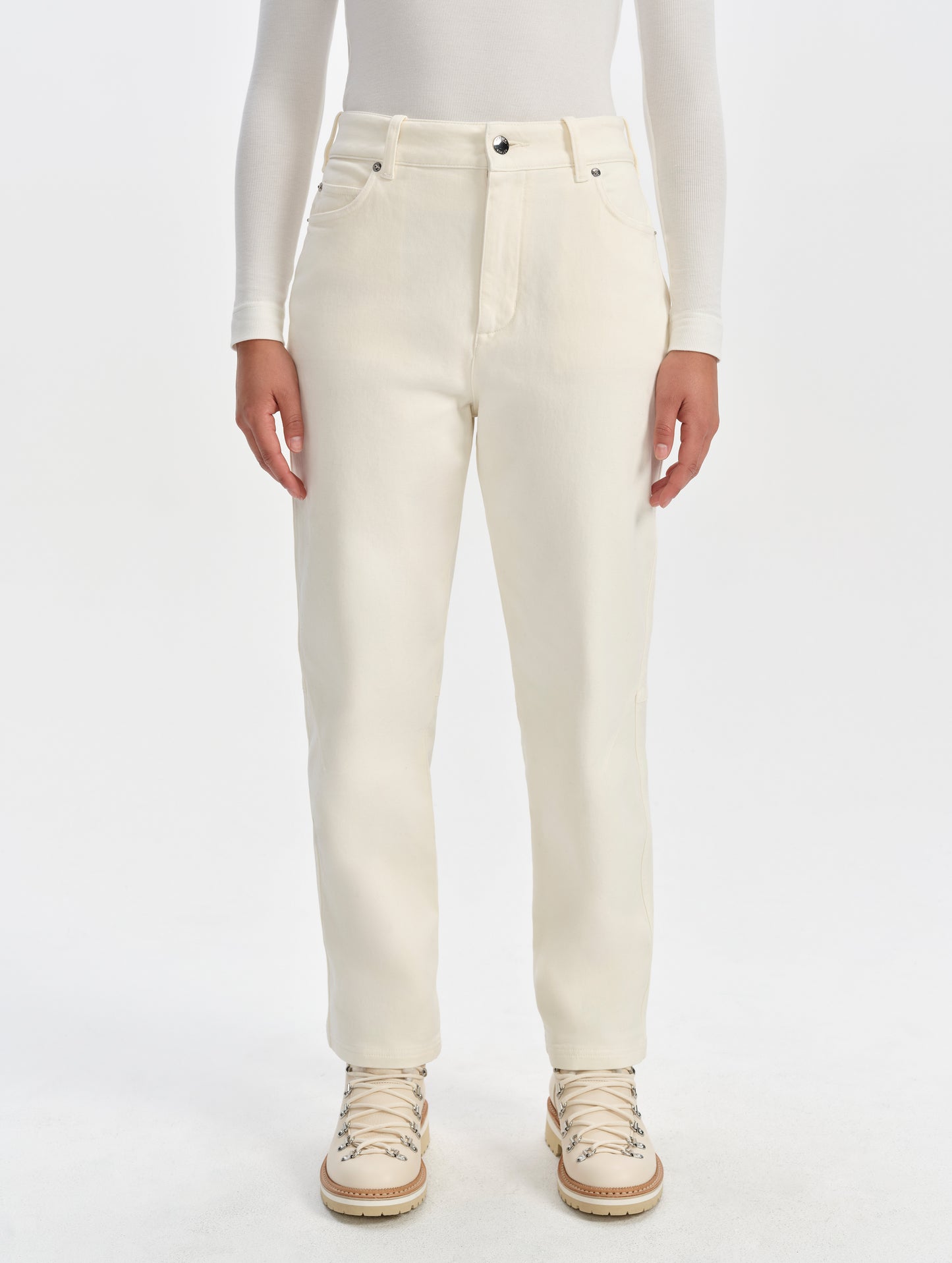 Front lower-body view of woman wearing the Rowan Cotton Pant in Winter White from AETHER Apparel.