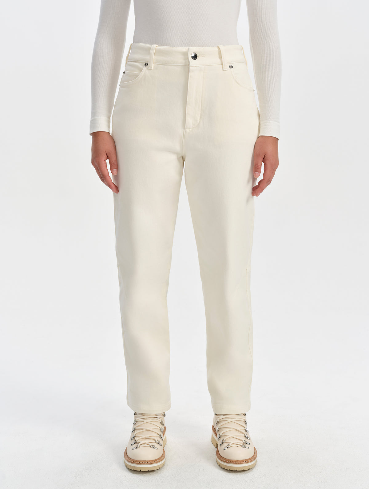 Front lower-body view of woman wearing the Rowan Cotton Pant in Winter White from AETHER Apparel.