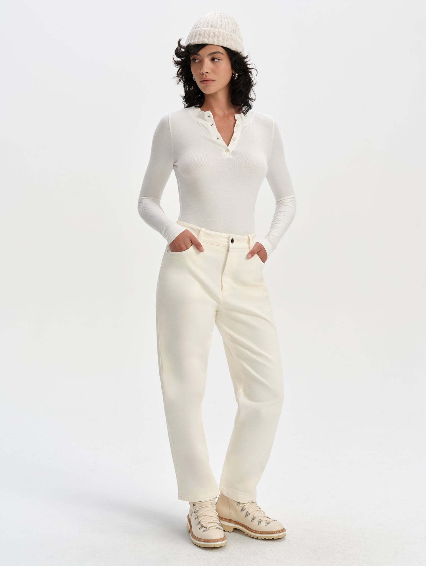 Front full-body view of woman wearing the Rowan Cotton Pant in Winter White from AETHER Apparel.