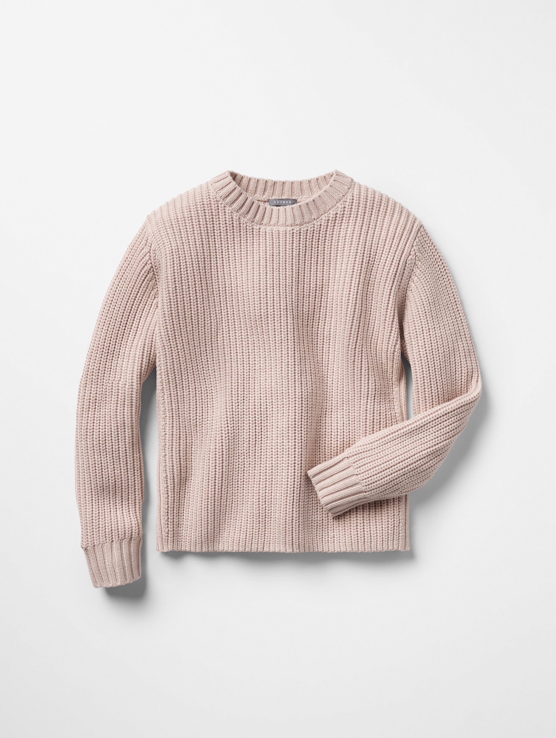 Flat lay of woman women's Sherwood Crewneck Sweater in Blush beige from AETHER Apparel.