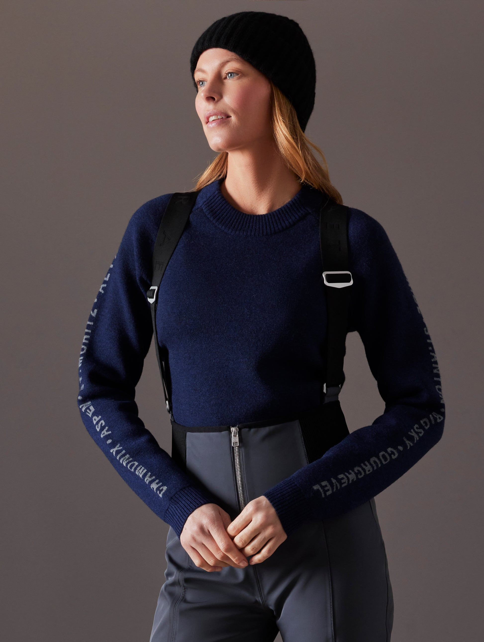 woman wearing dark blue sweater from AETHER Apparel