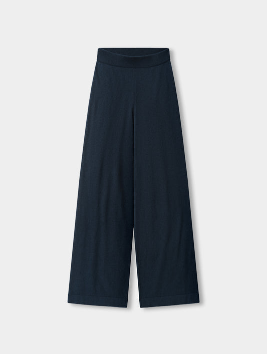 Flat lay view of the Solace Cashmere Pant in Total Eclipse from AETHER Apparel.