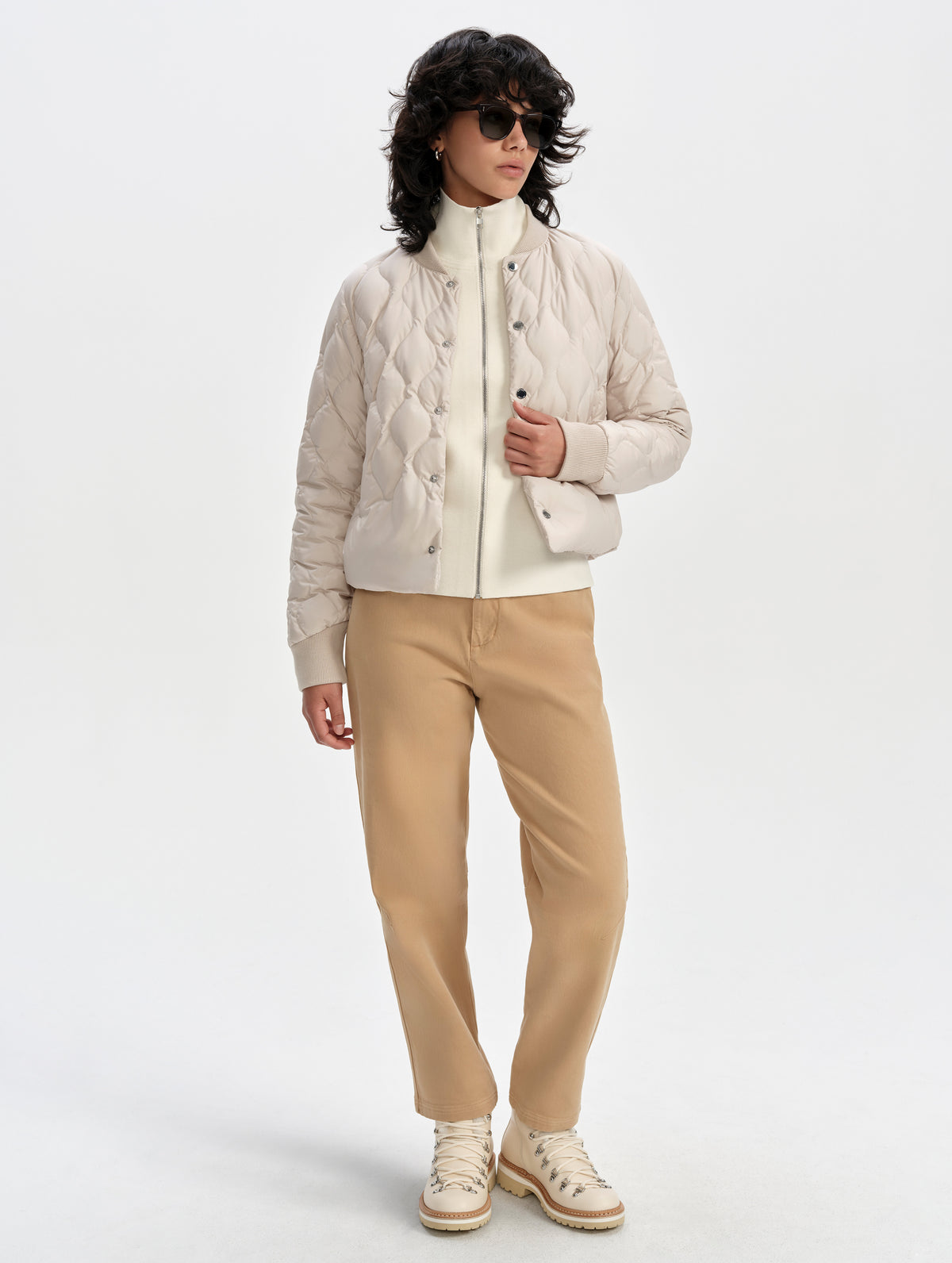 Front full-body view of woman wearing the Stella Liner Jacket in Bone from AETHER Apparel.