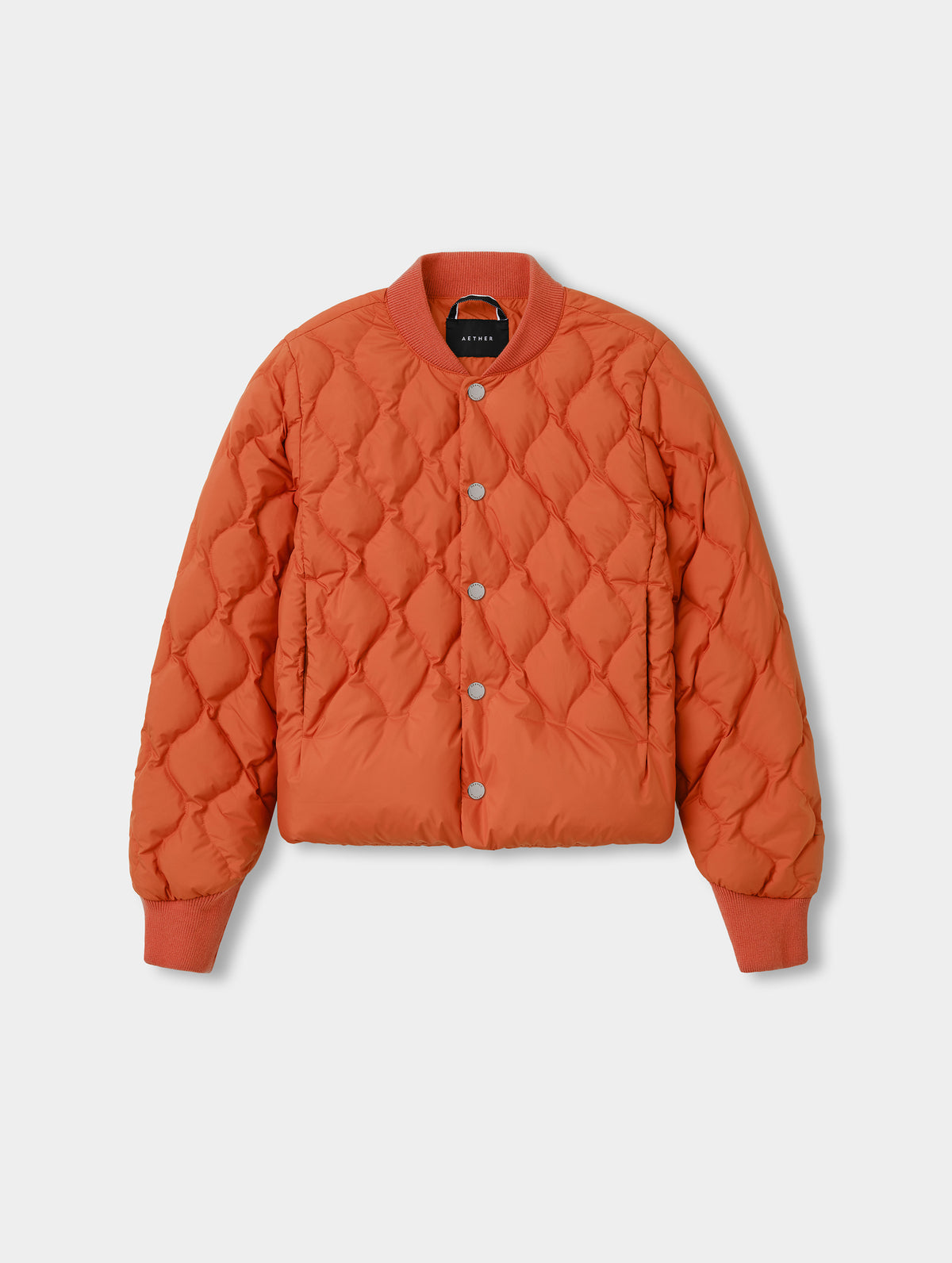 Flat lay view of the Stella Liner Jacket in Madeira Orange from AETHER Apparel.