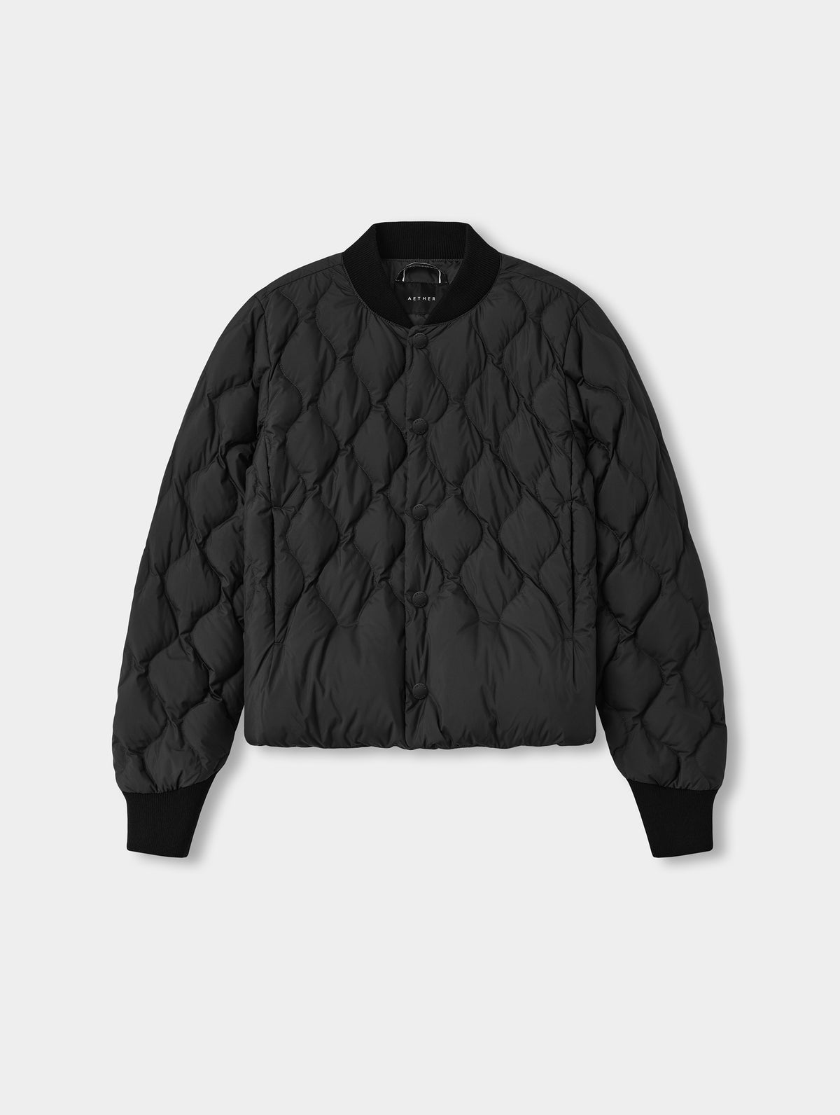 Flat lay view of the Stella Liner Jacket in Onyx Black from AETHER Apparel.