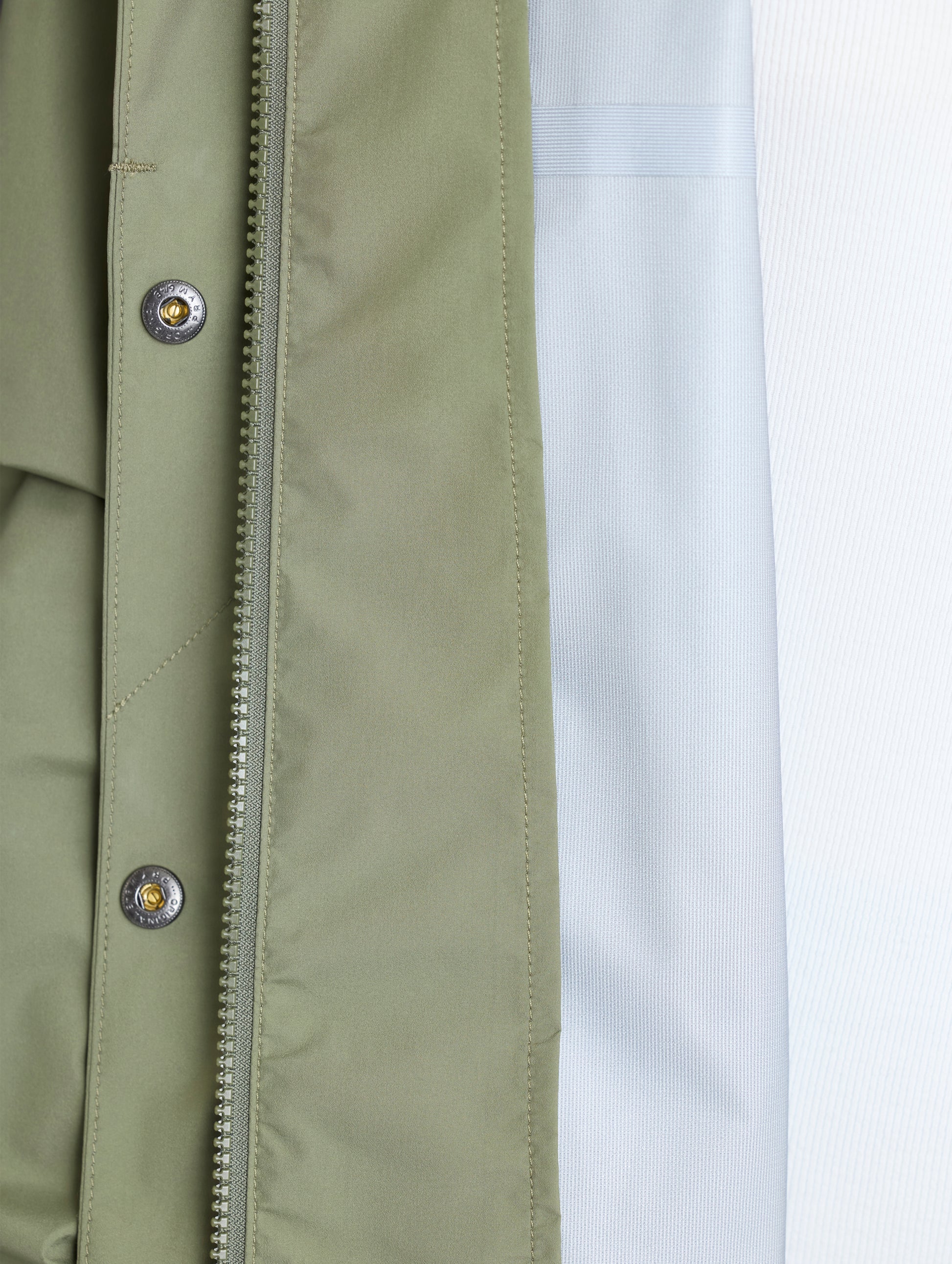 Closeup view of interior left of Storm All-Weather Jacket in Fern Green from AETHER Apparel.