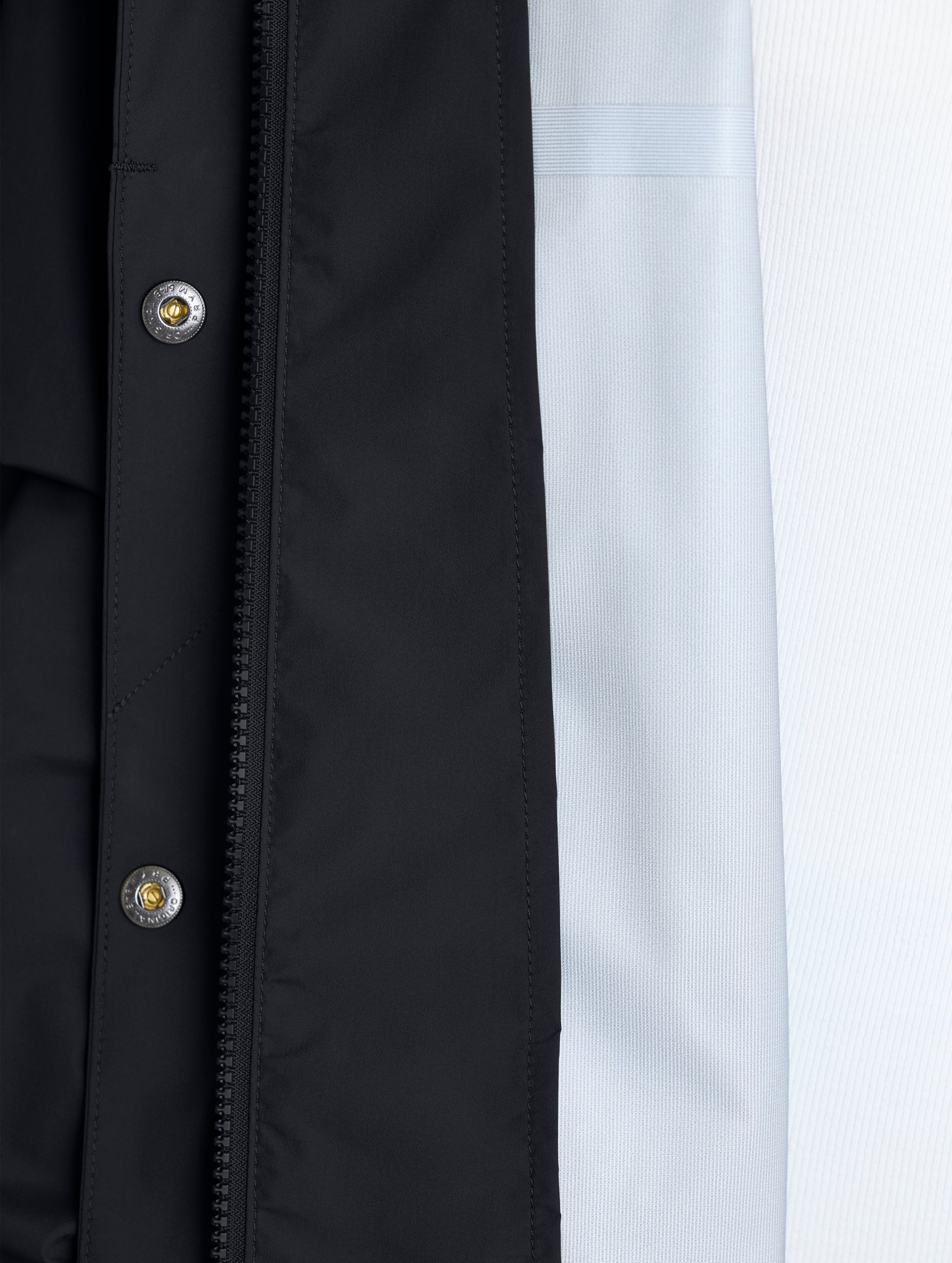 Closeup of left interior of Storm All-Weather Jacket in Onyx Black from AETHER Apparel.