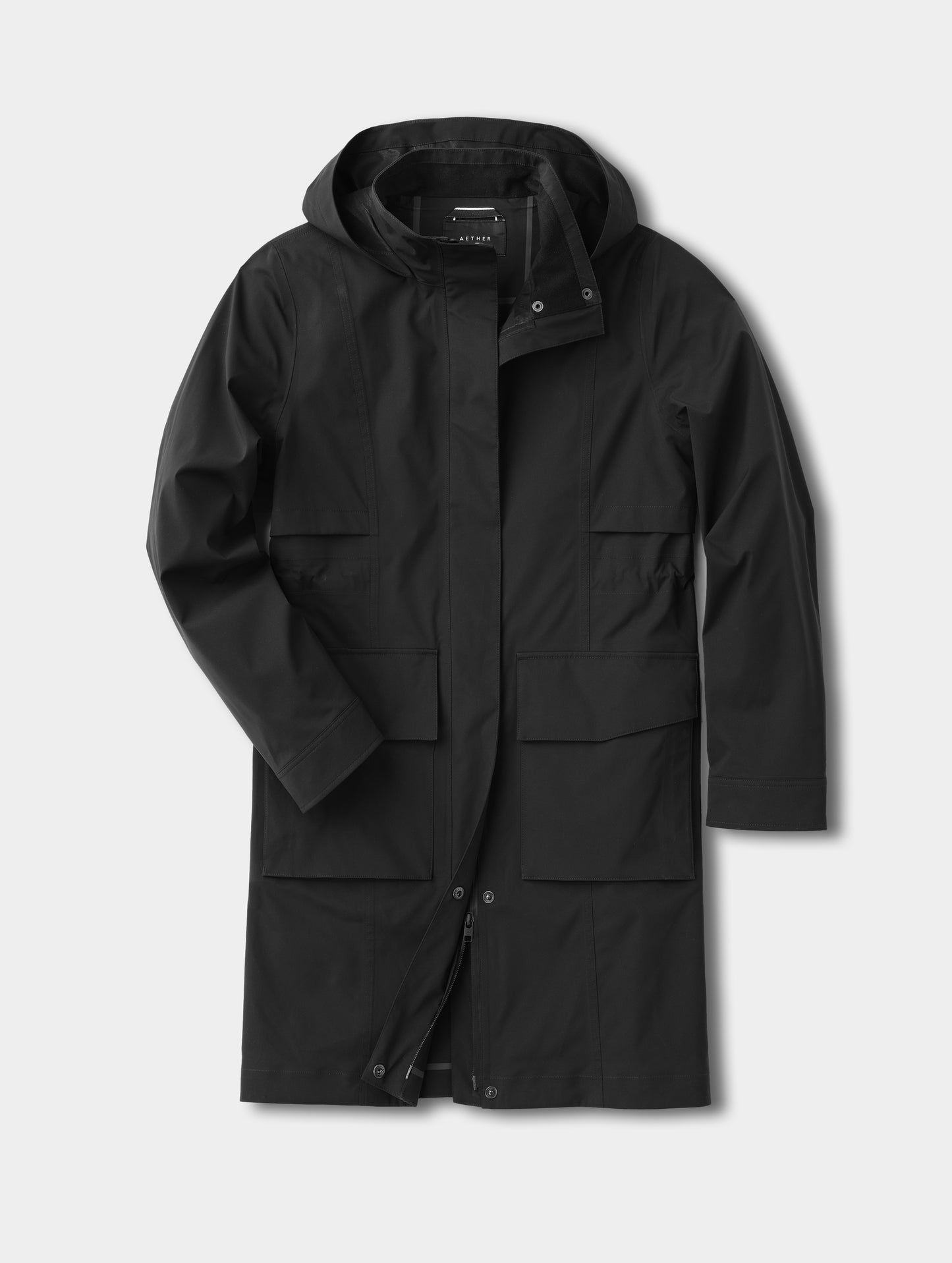 Flat lay view of the front of the women's Wallace Rain Parka in Onyx Black from AETHER Apparel.