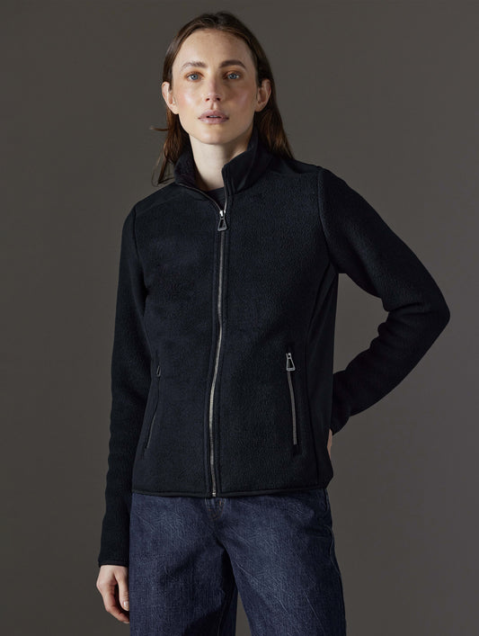 woman wearing black fleece from AETHER Apparel