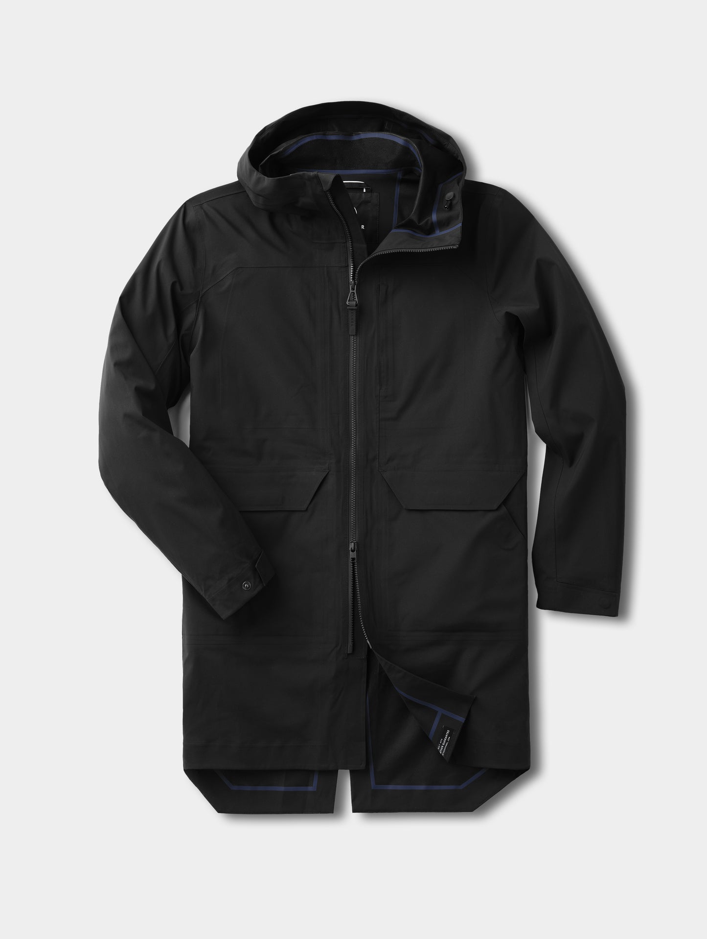 Flat lay view of the men's Wallace Rain Parka in Onyx Black from AETHER Apparel.