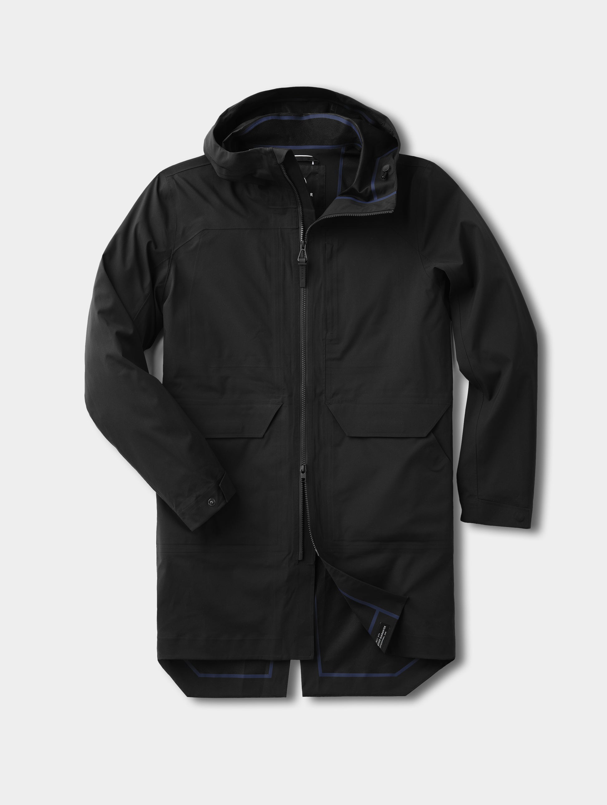 Flat lay view of the men's Wallace Rain Parka in Onyx Black from AETHER Apparel.