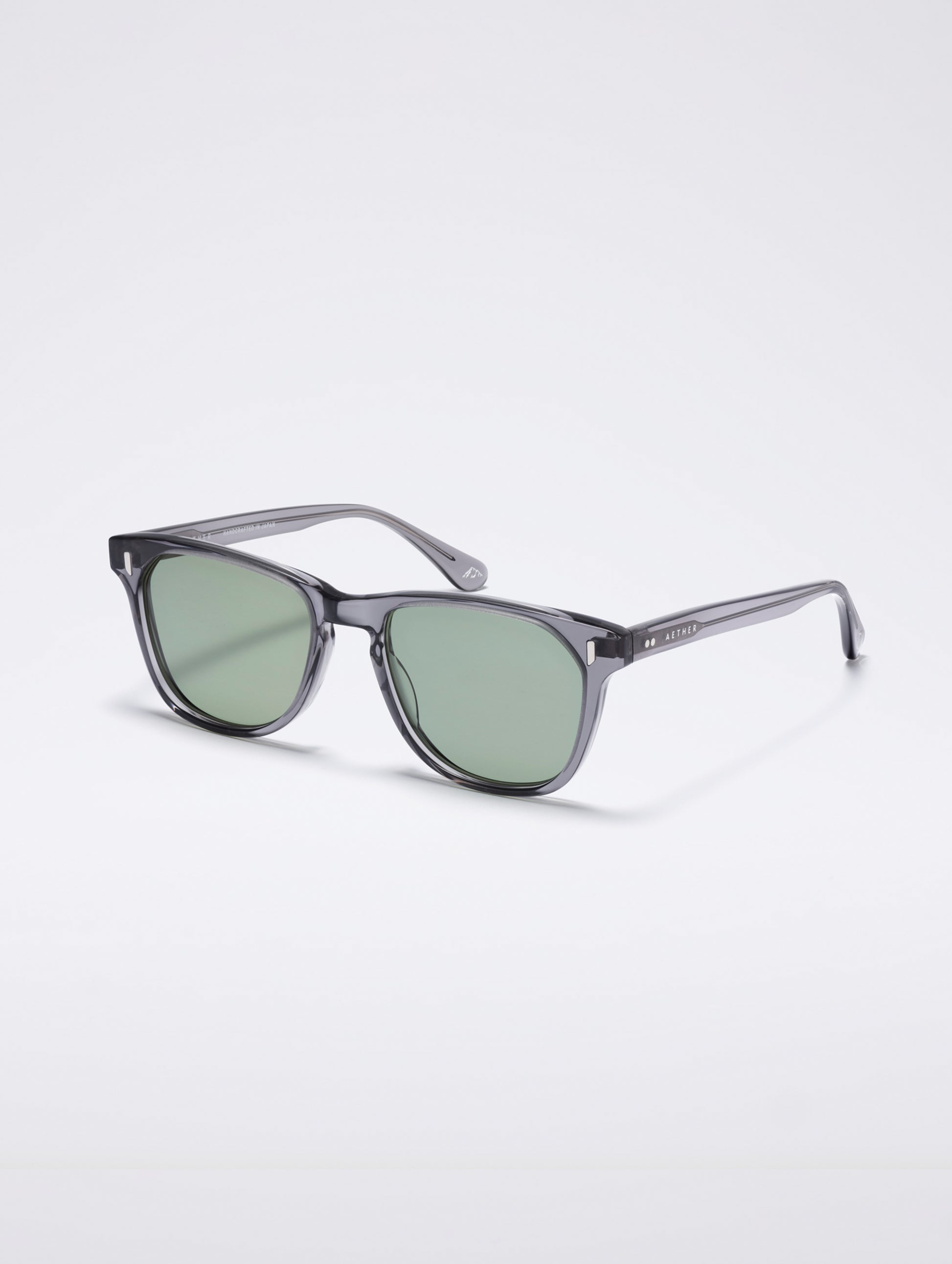 Front 3/4 view of Yosemite Sunglass in transparent Grey with Grey Lens from AETHER Apparel.