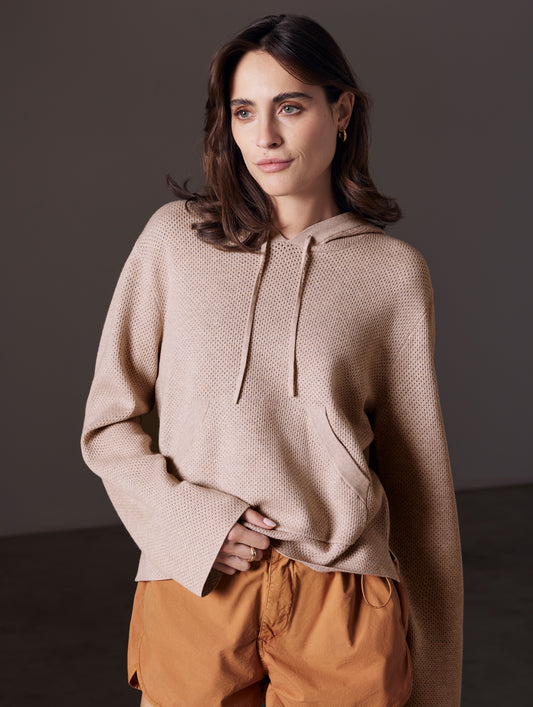 woman wearing beige sweater from AETHER Apparel