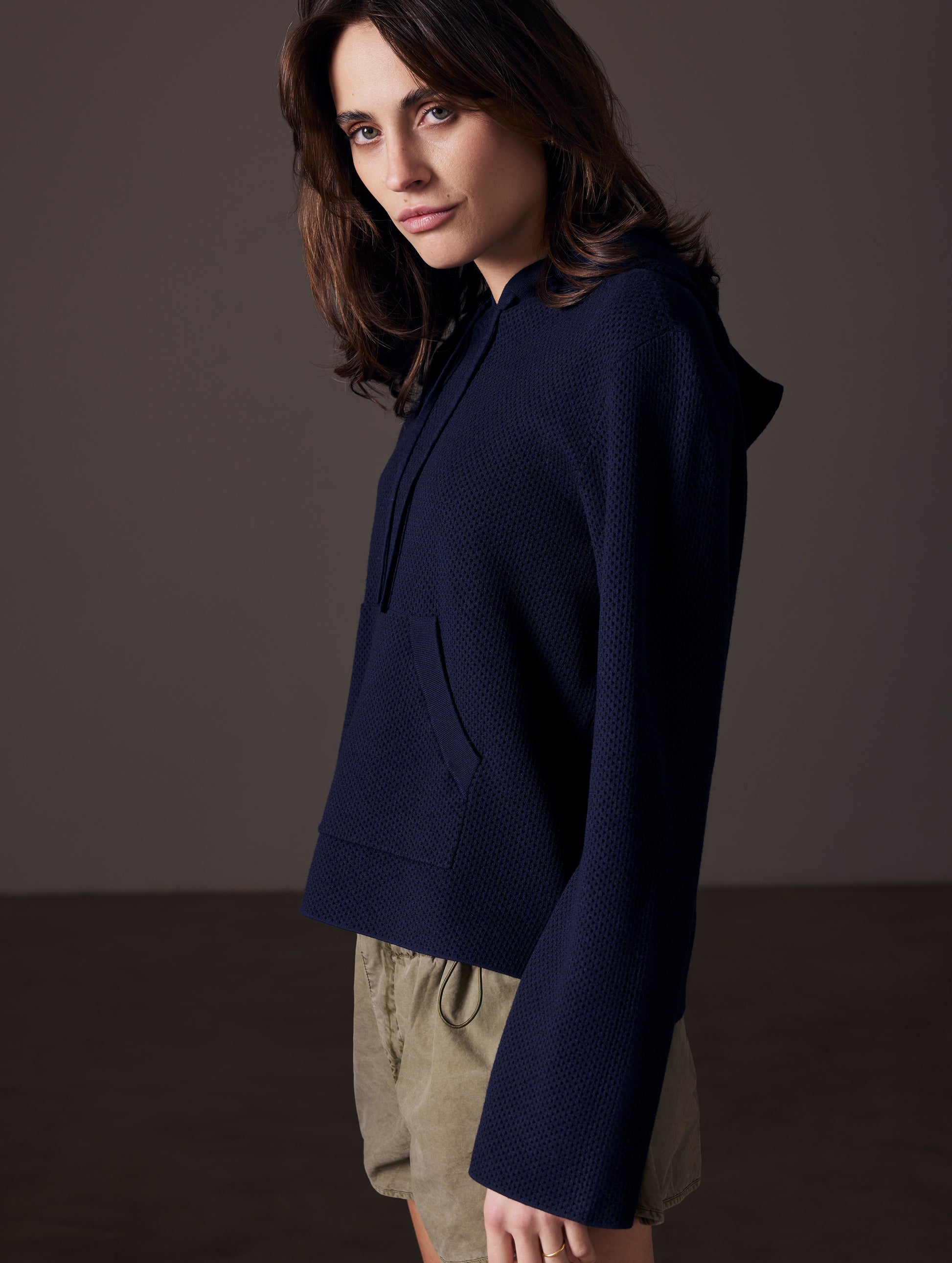 woman wearing blue sweater from AETHER Apparel