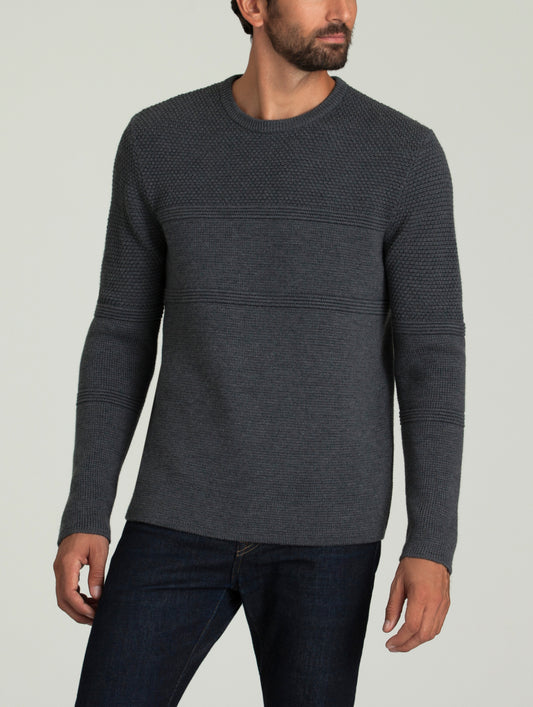 man wearing dark grey sweater