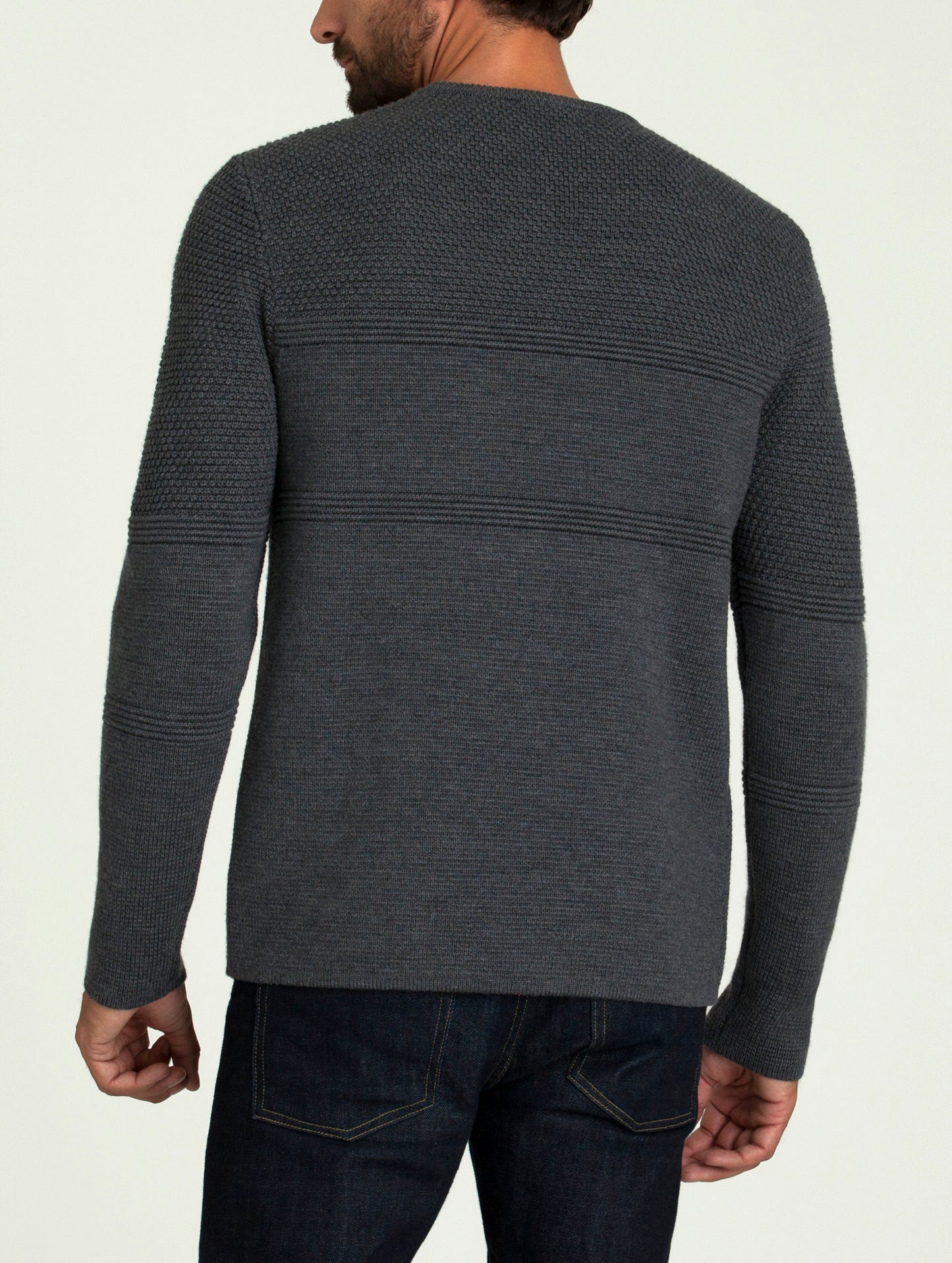 man wearing dark grey sweater