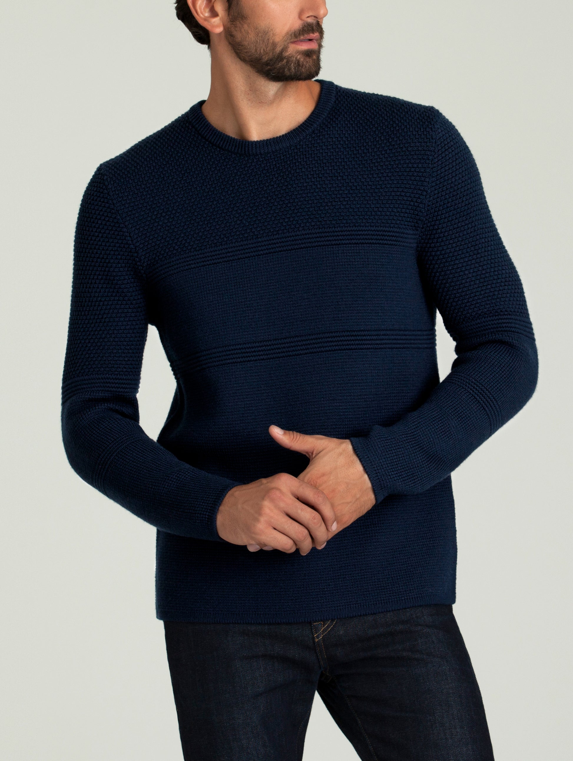 man wearing dark blue sweater