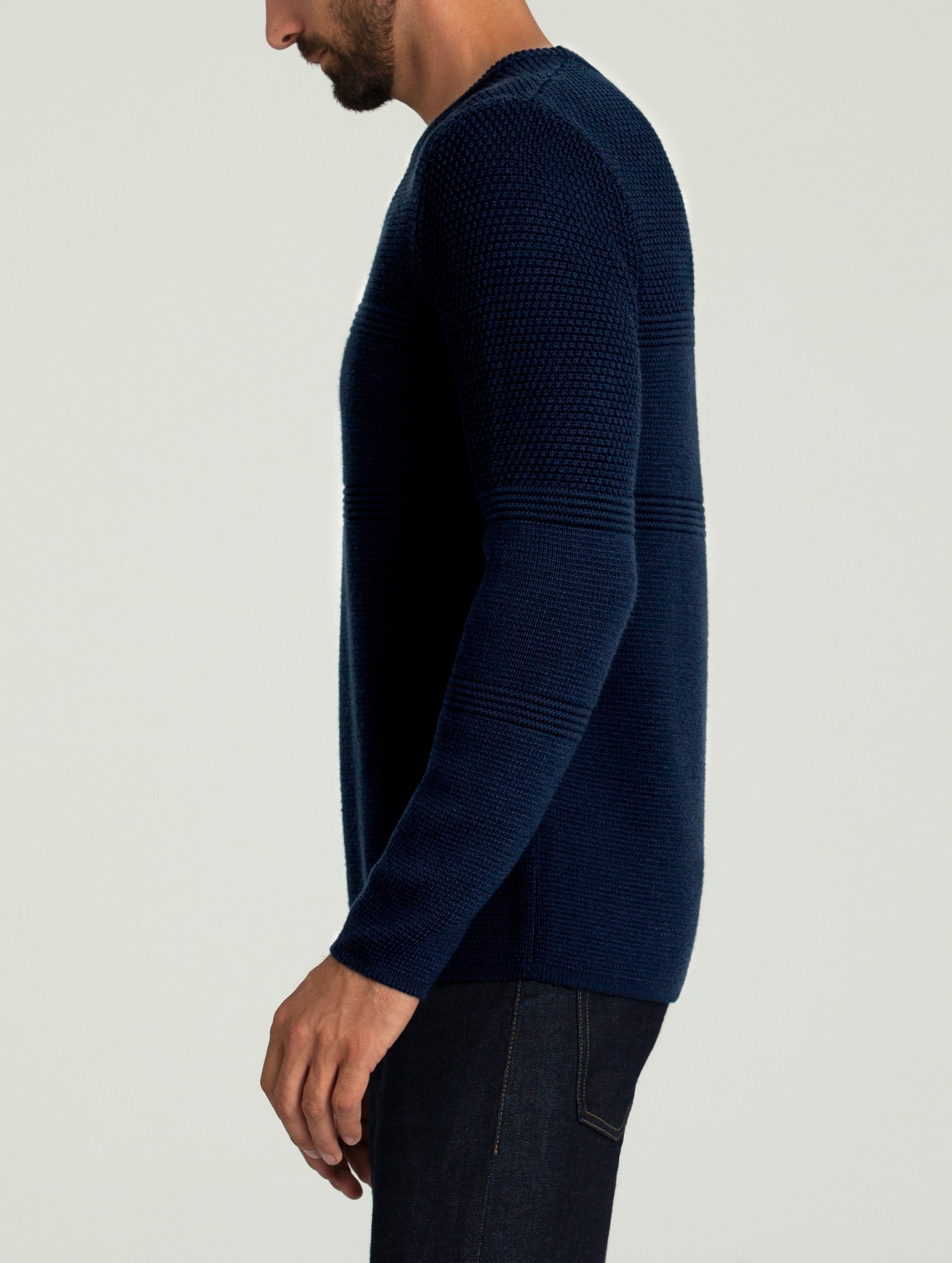 man wearing dark blue sweater