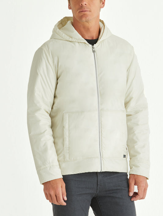 Man wearing white insulated hoodie from AETHER Apparel