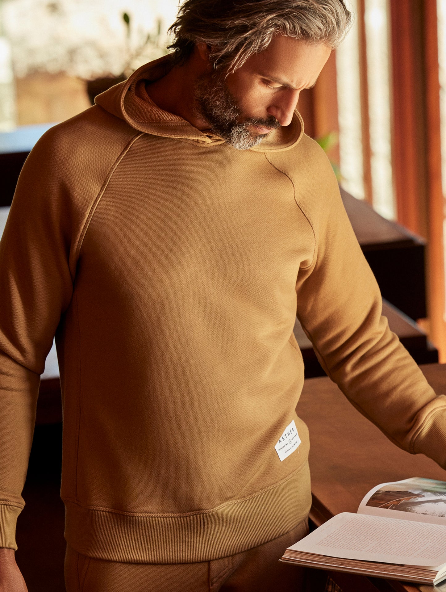 man wearing a brown hoodie