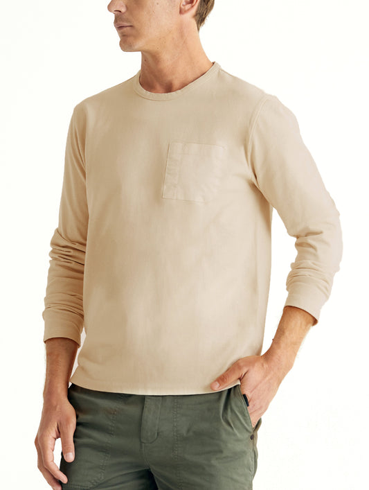 man wearing beige long sleeve shirt