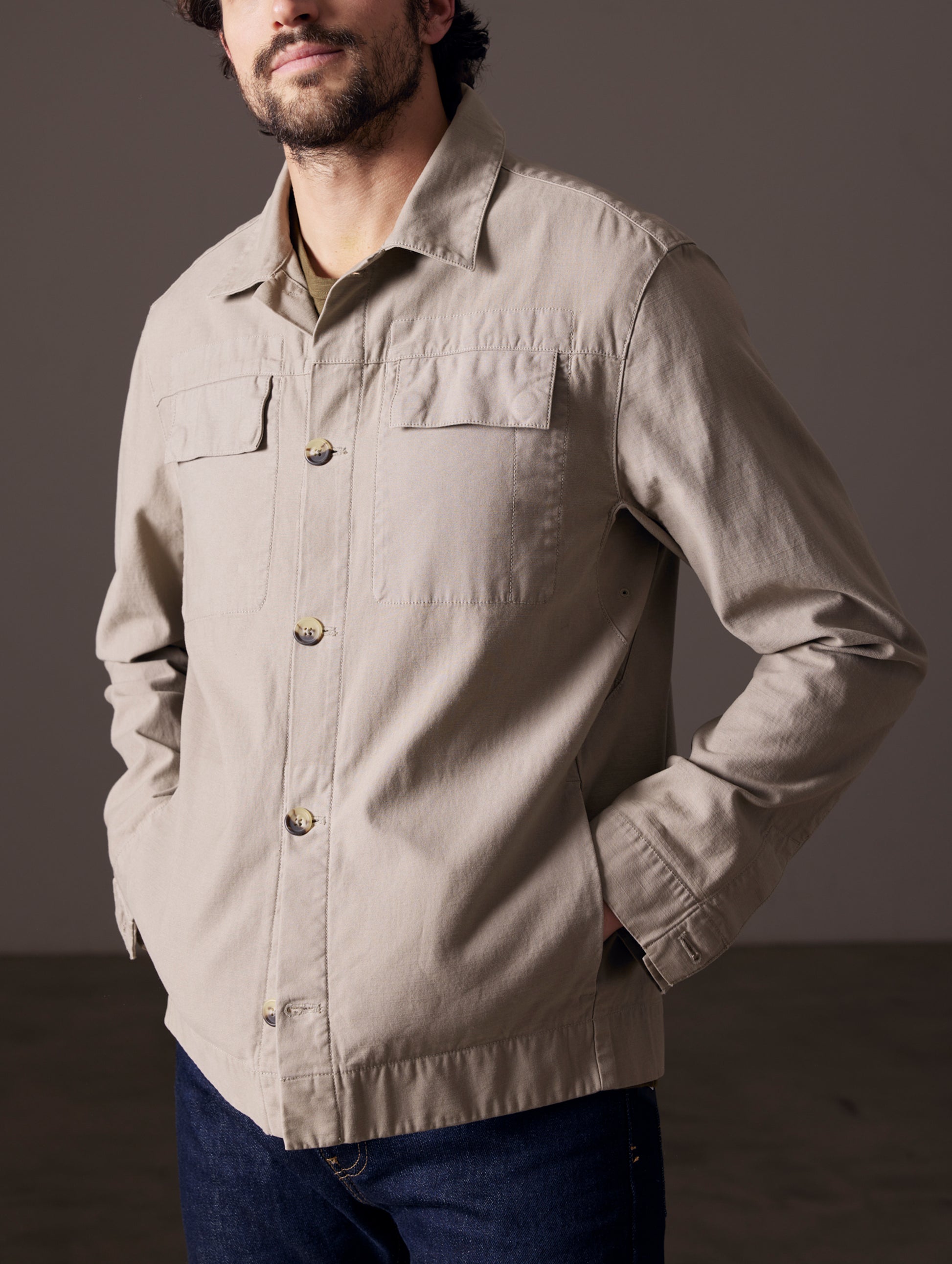 Man wearing light grey shirt jacket from AETHER Apparel