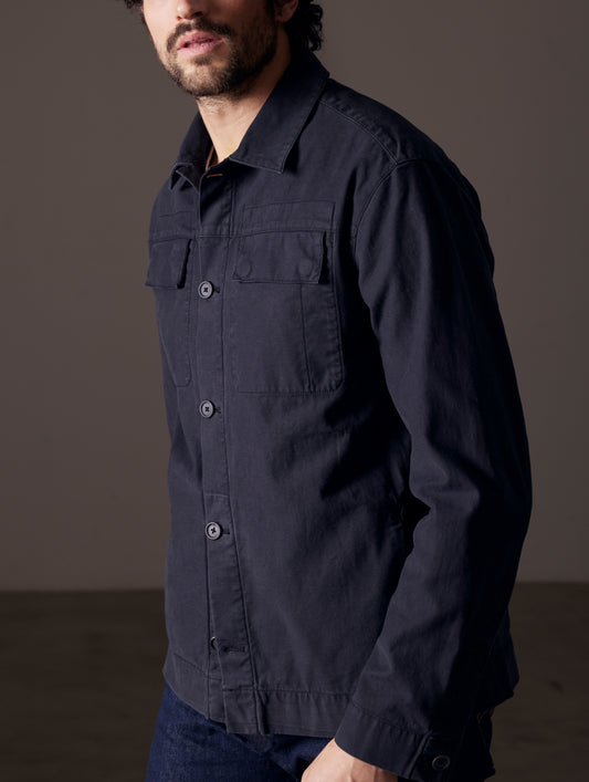 Man wearing black shirt jacket from AETHER Apparel