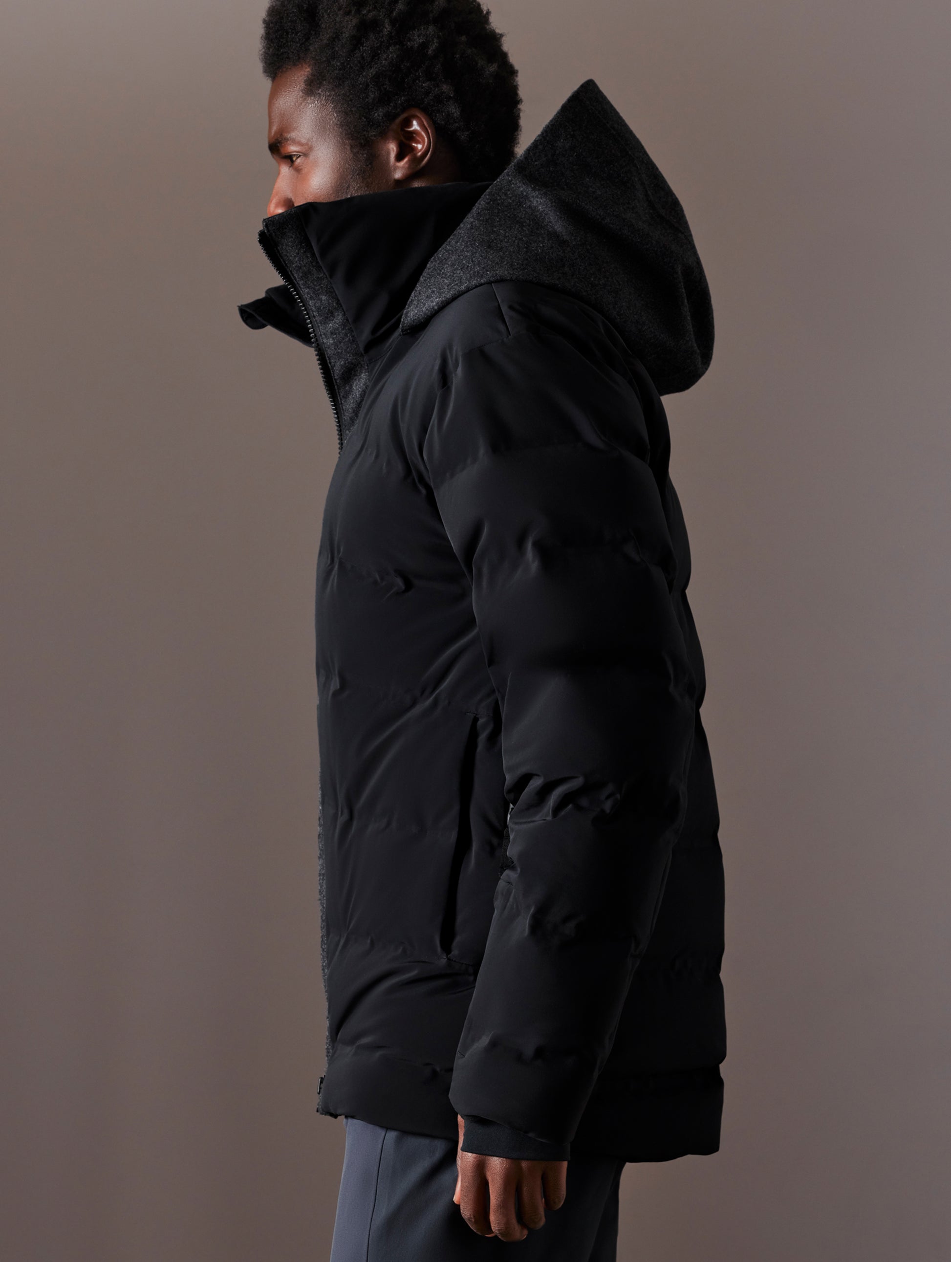 Man wearing black ski jacket