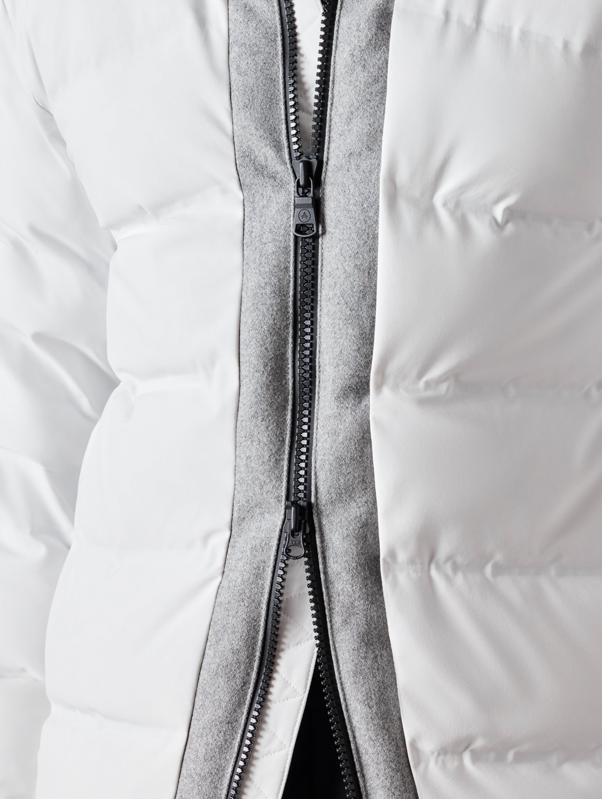 close up of white men's ski jacket from AETHER Apparel