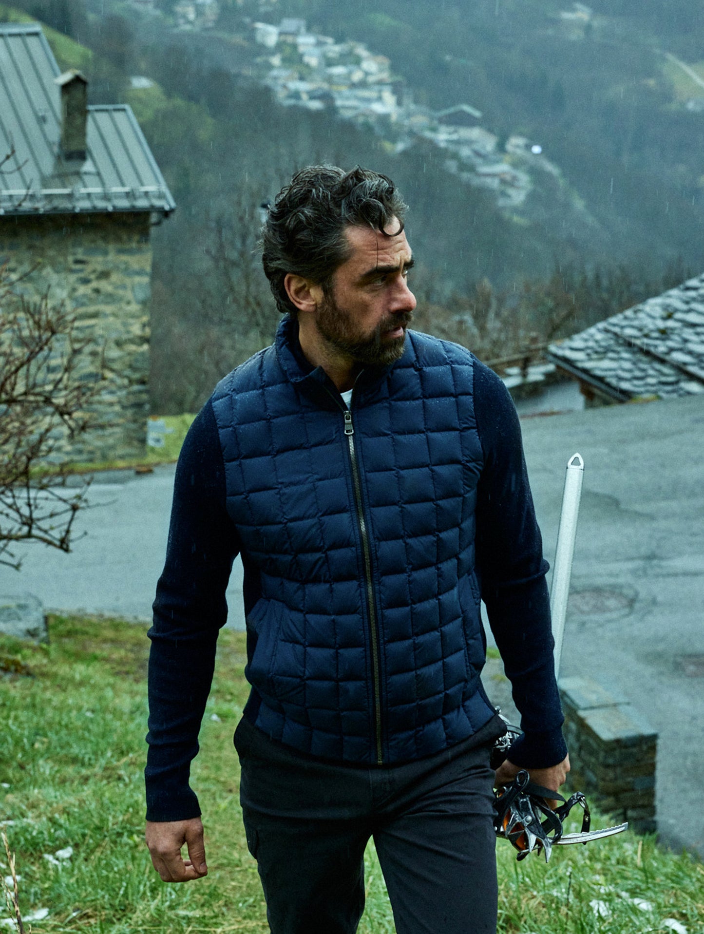 man wearing quilted blue full-zip sweater