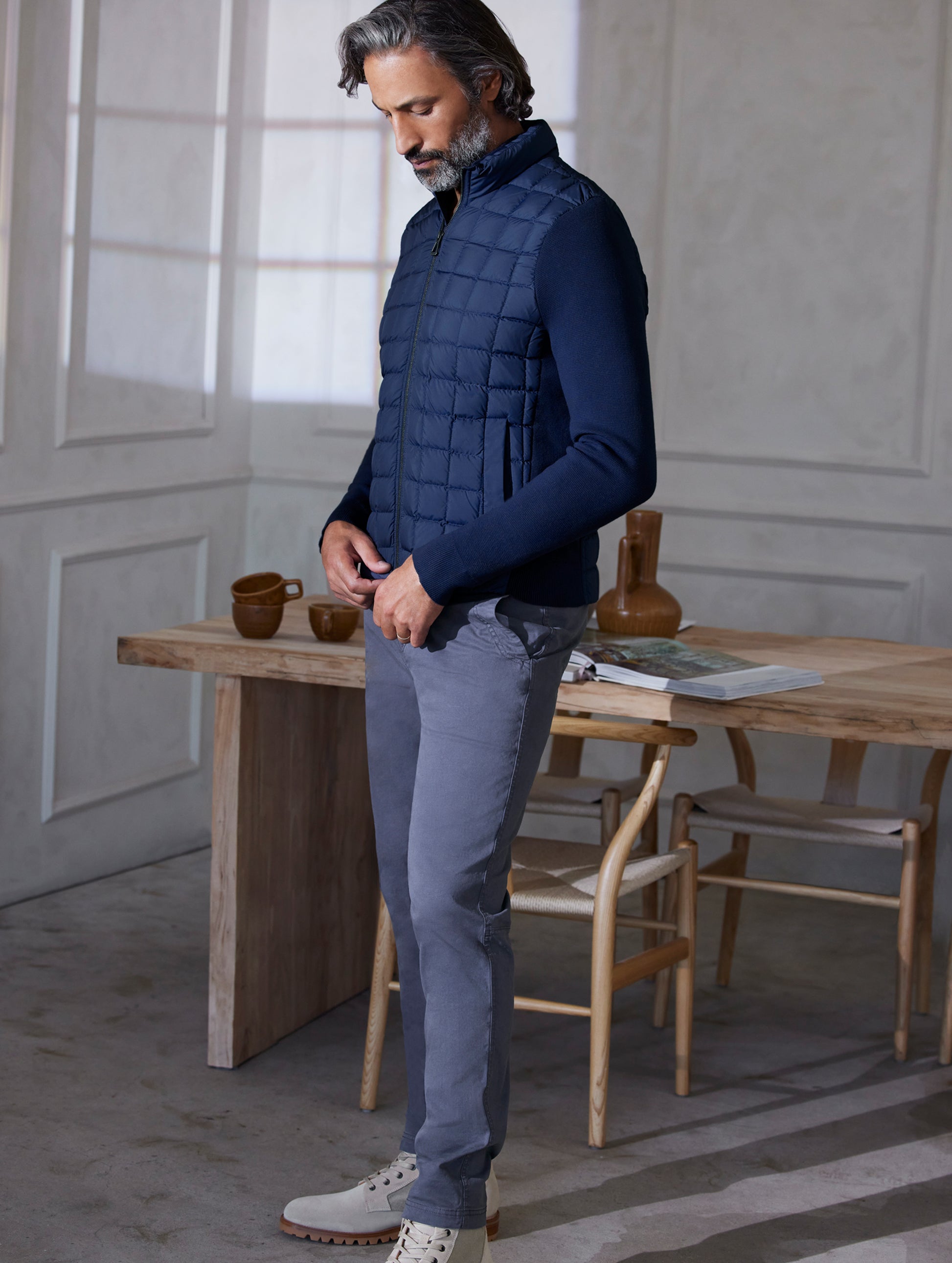 man wearing quilted blue full-zip sweater