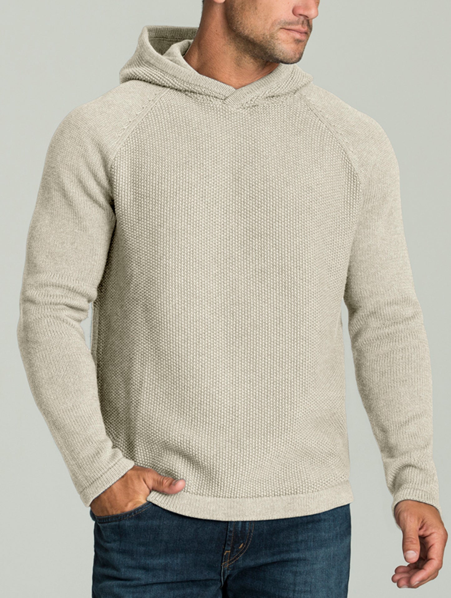 man wearing beige hooded sweater