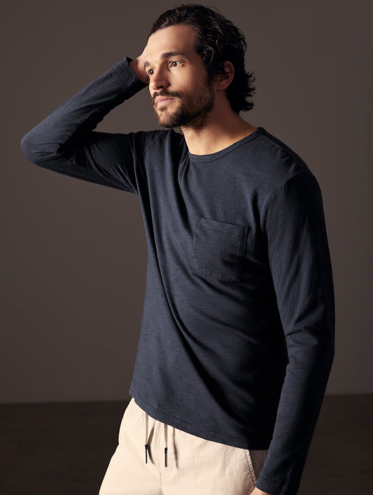 man wearing blue long-sleeve tee from AETHER Apparel