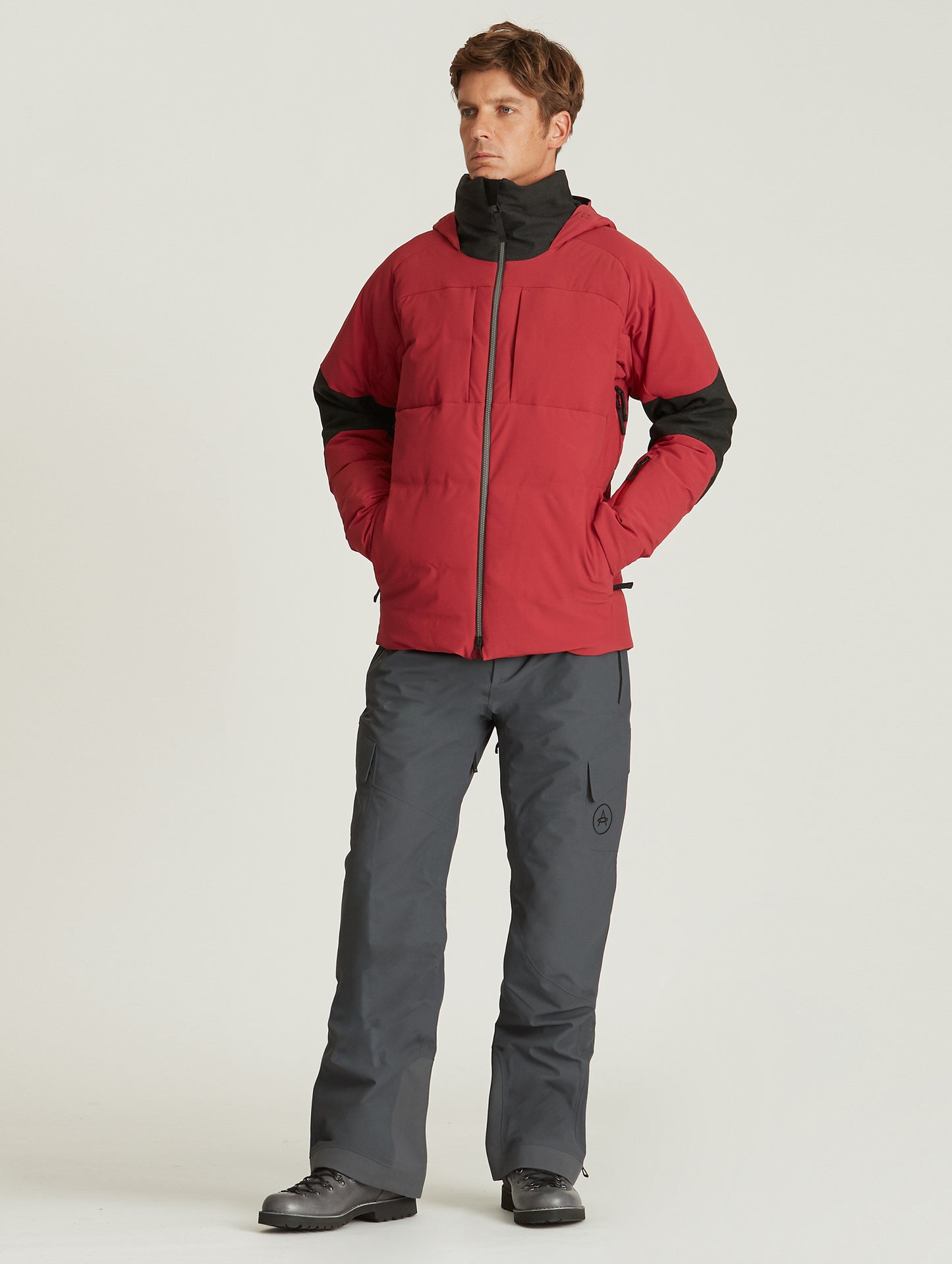 man wearing red ski jacket from Aether Apparel