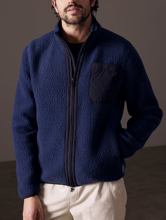 man wearing blue fleece full-zip