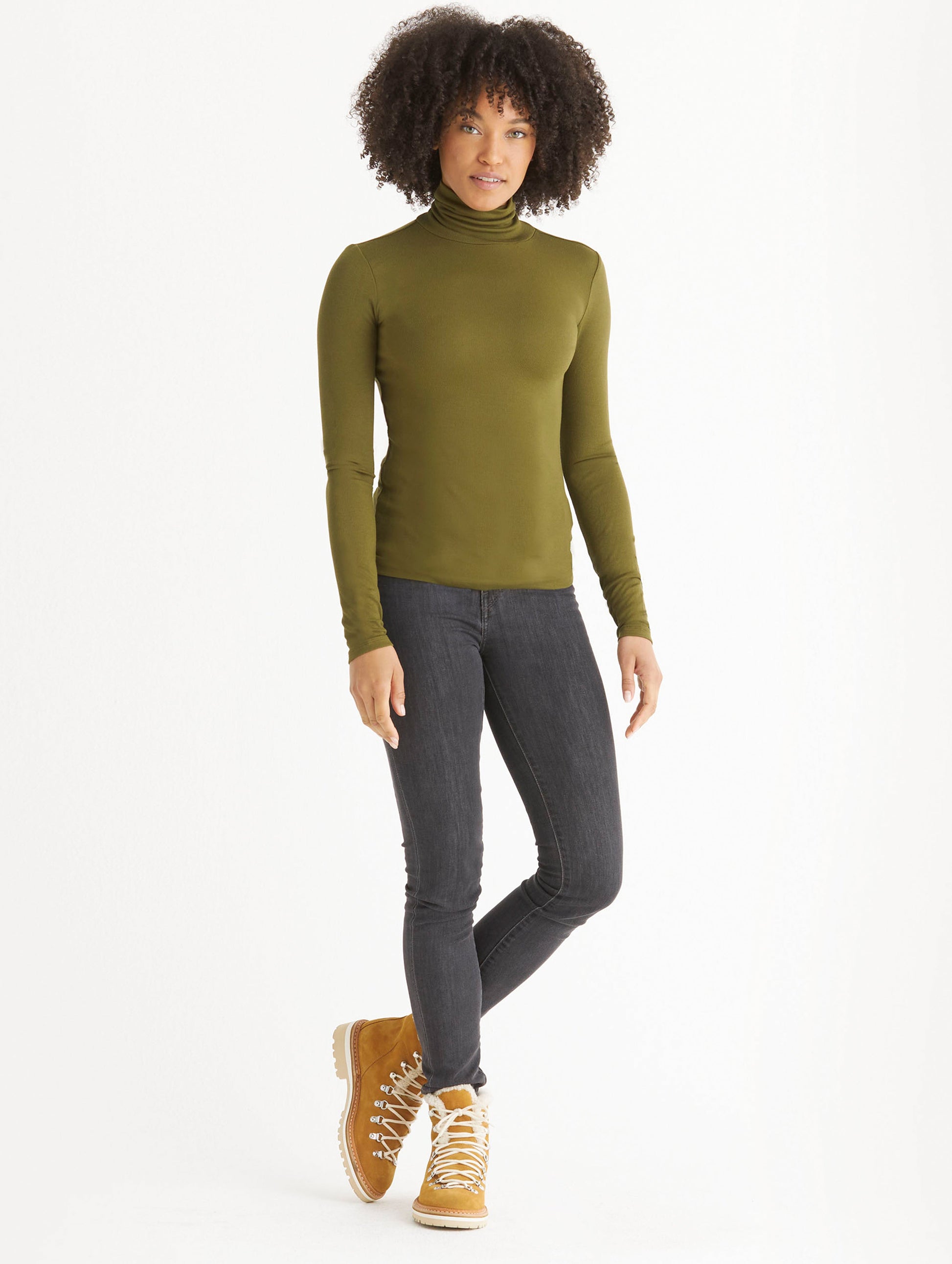 woman wearing green long-sleeve shirt from Aether Apparel