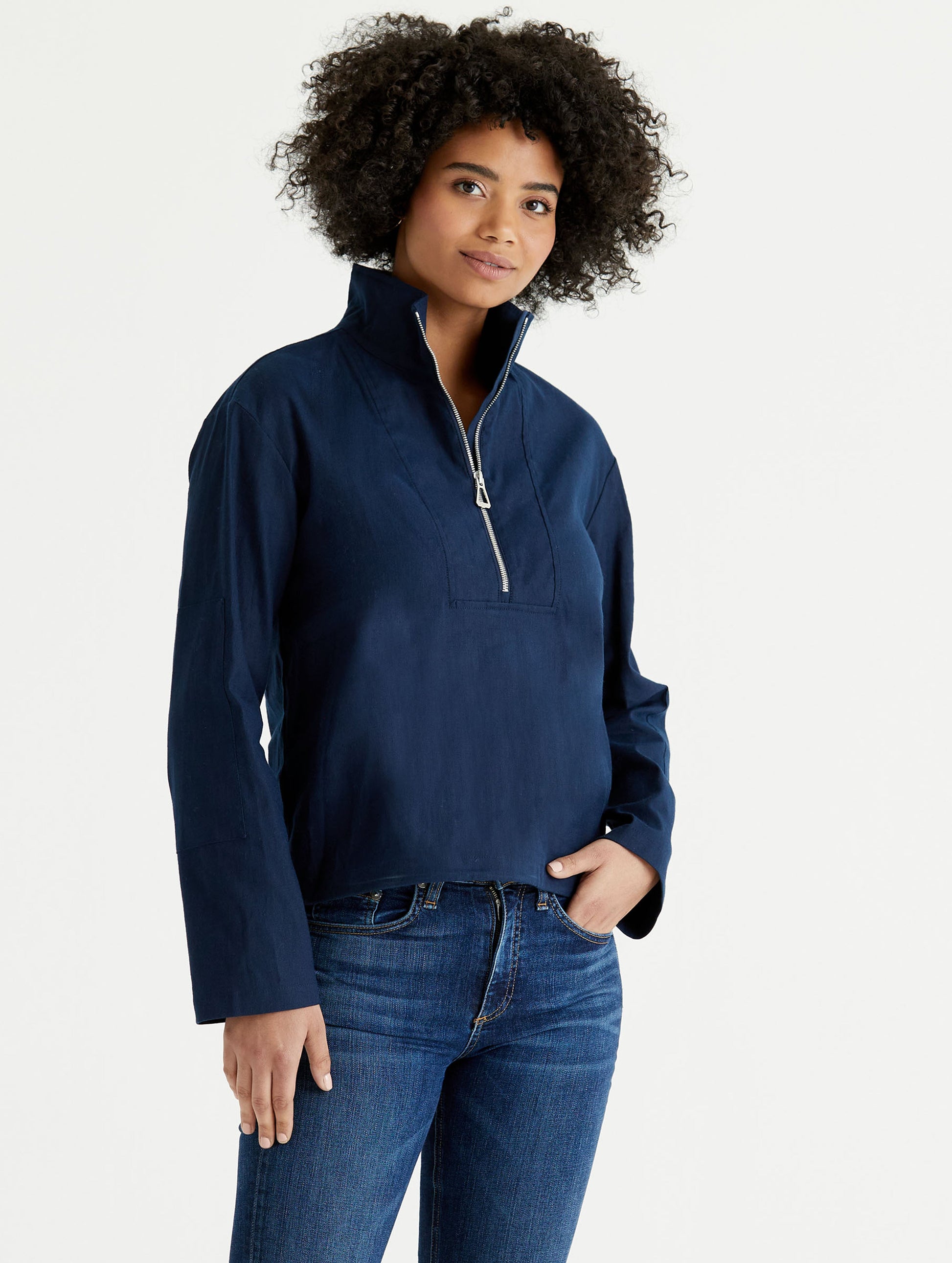 woman wearing dark blue anorak