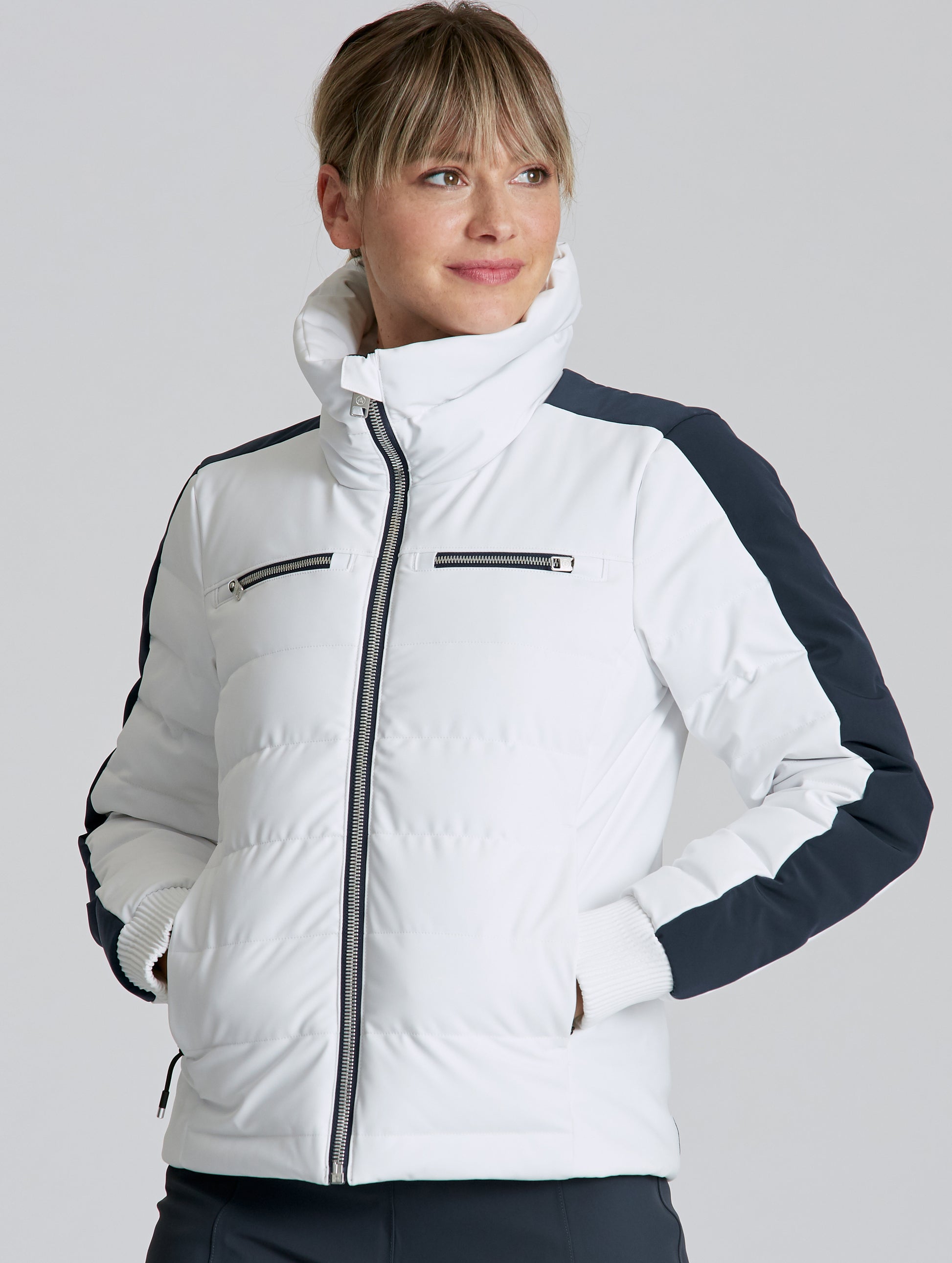 Front view of woman wearing W Nordic Jacket in studio