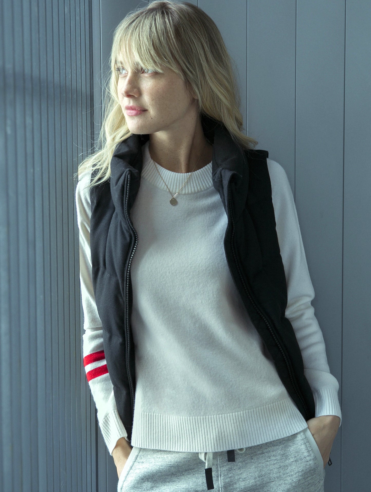 woman wearing white sweater from AETHER Apparel