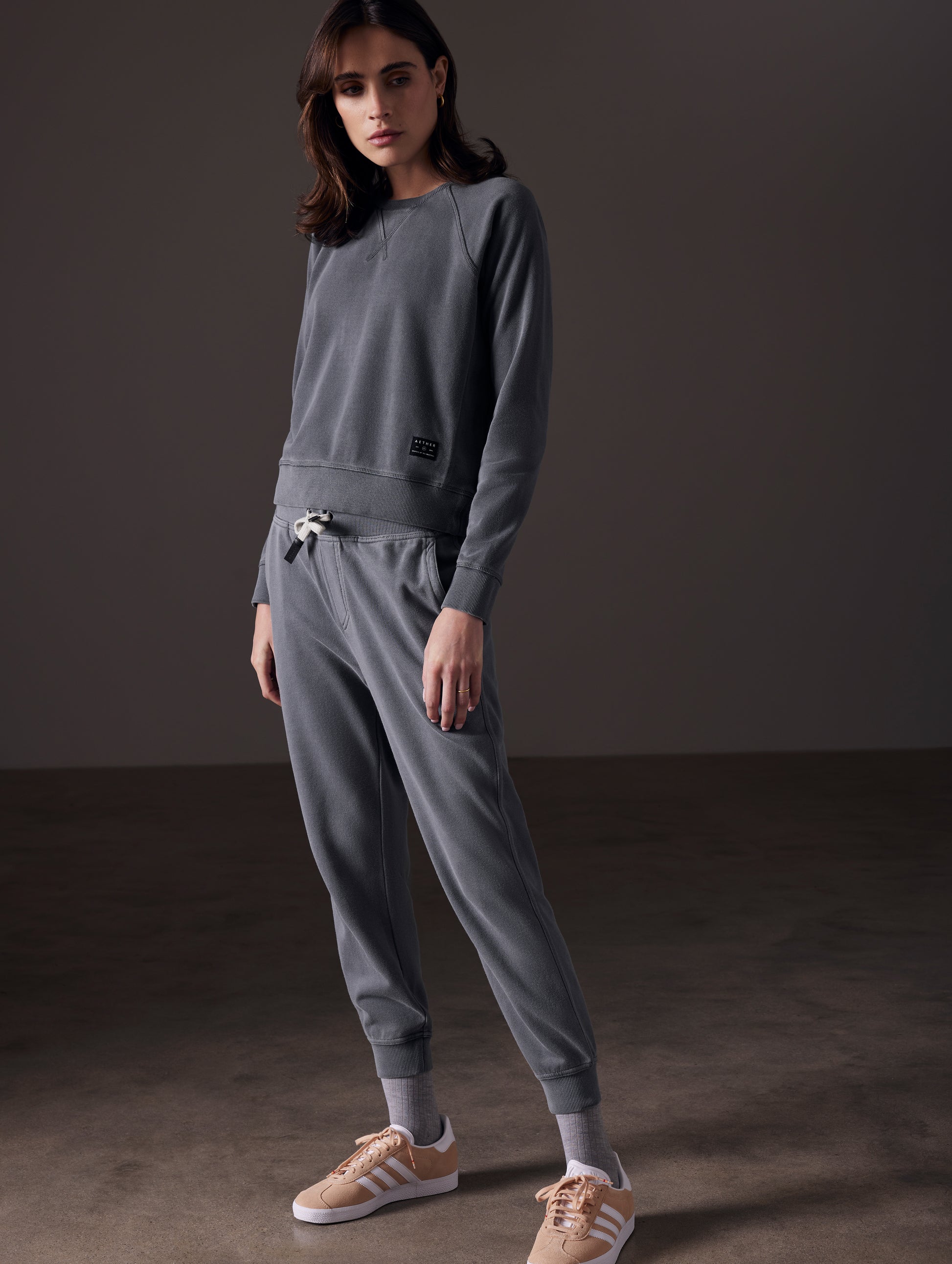woman wearing grey pullover from AETHER Apparel